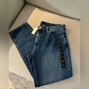 The Beau Jean features a mid rise and slightly tapered leg for a modern cut.